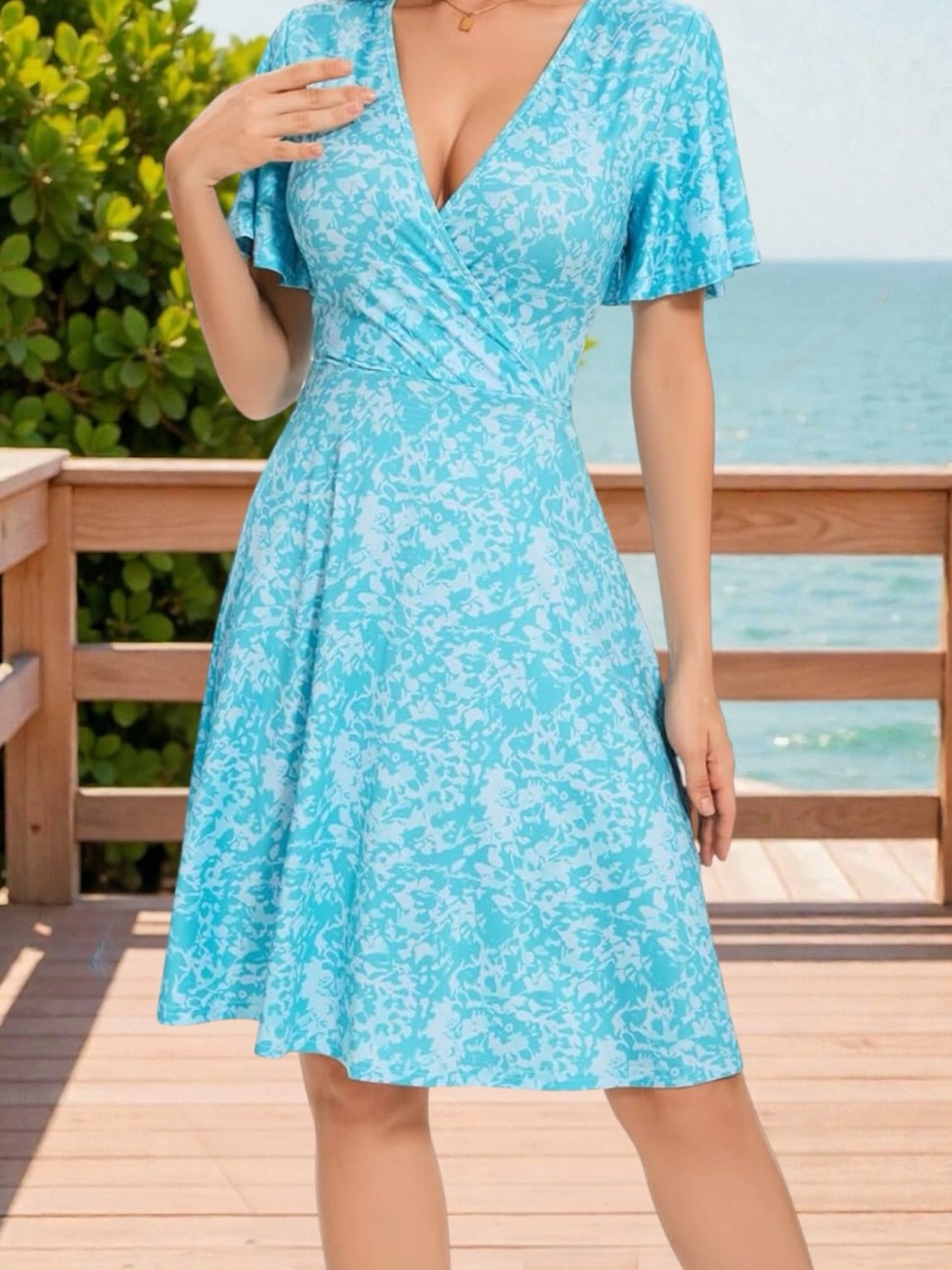 Turquoise Faux Wrap Dress Flutter Sleeves Size Medium NWOT